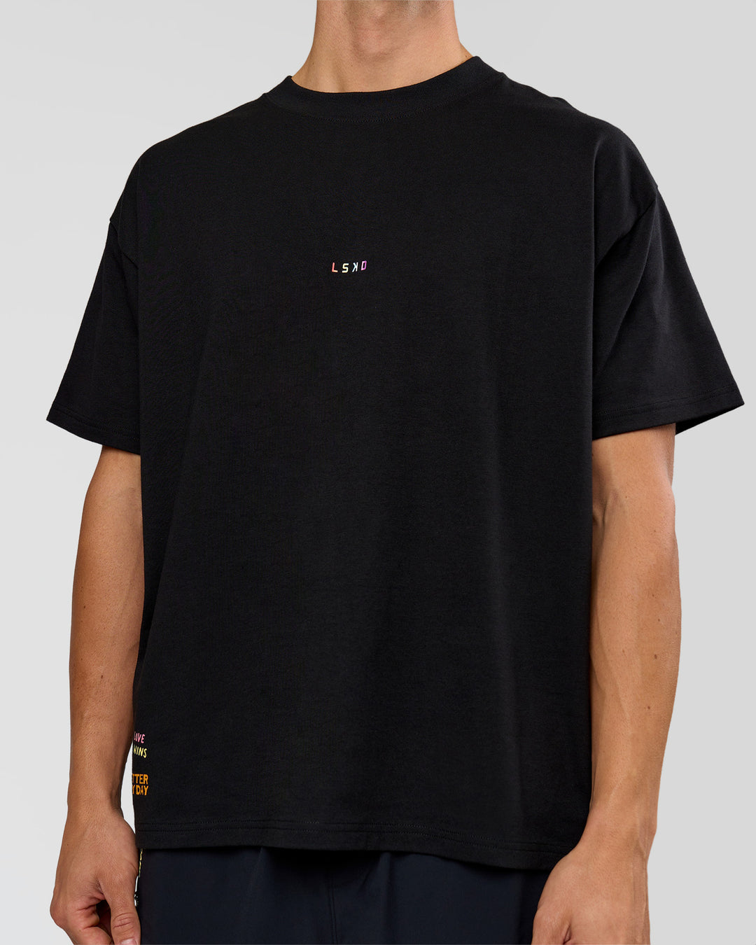 Man wearing Pride Sticker Boxy Tee - Black | Model:Albert | Size:M