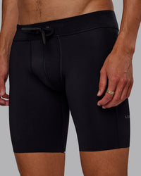 Man wearing Race Day Short Tight 8" in Black | Model:Jaxon | Size:M