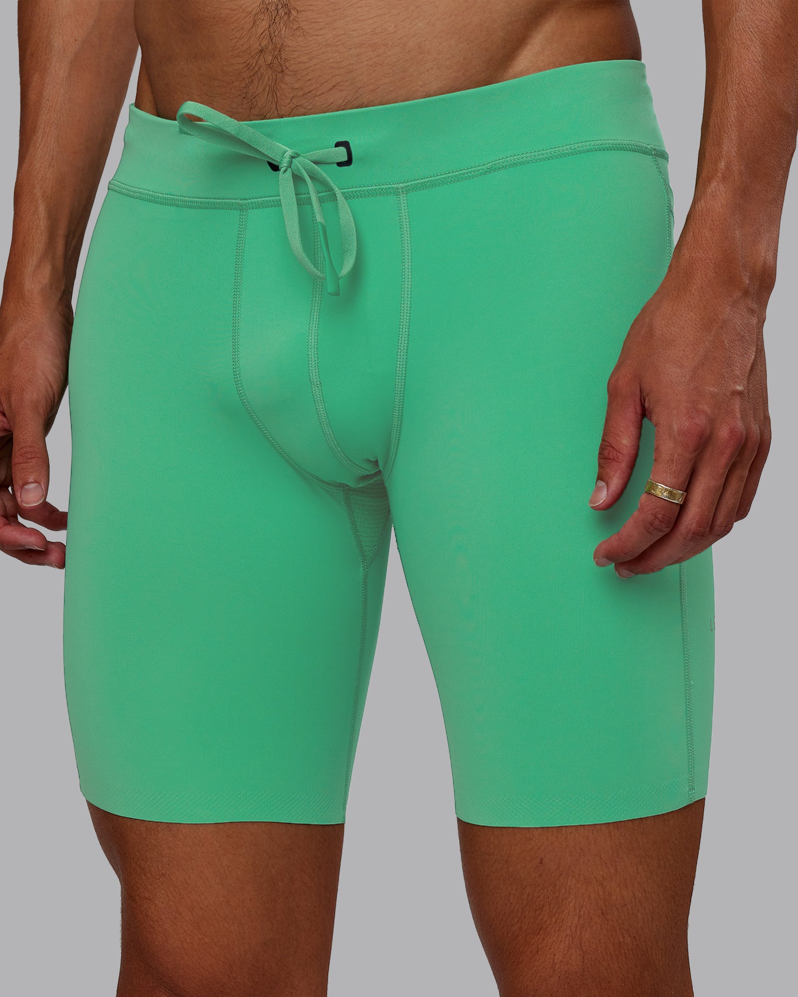 Man wearing Race Day Short Tight 8" - Mystic Green | Model:Jaxon | Size:M