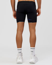 Man wearing Race Day 8" Short Tight - Black-Electric Indigo | Model:Albert | Size:M | | Thumbnail Index: 7