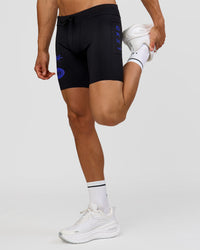 Man wearing Race Day 8" Short Tight - Black-Electric Indigo | Model:Albert | Size:M | | Thumbnail Index: 8