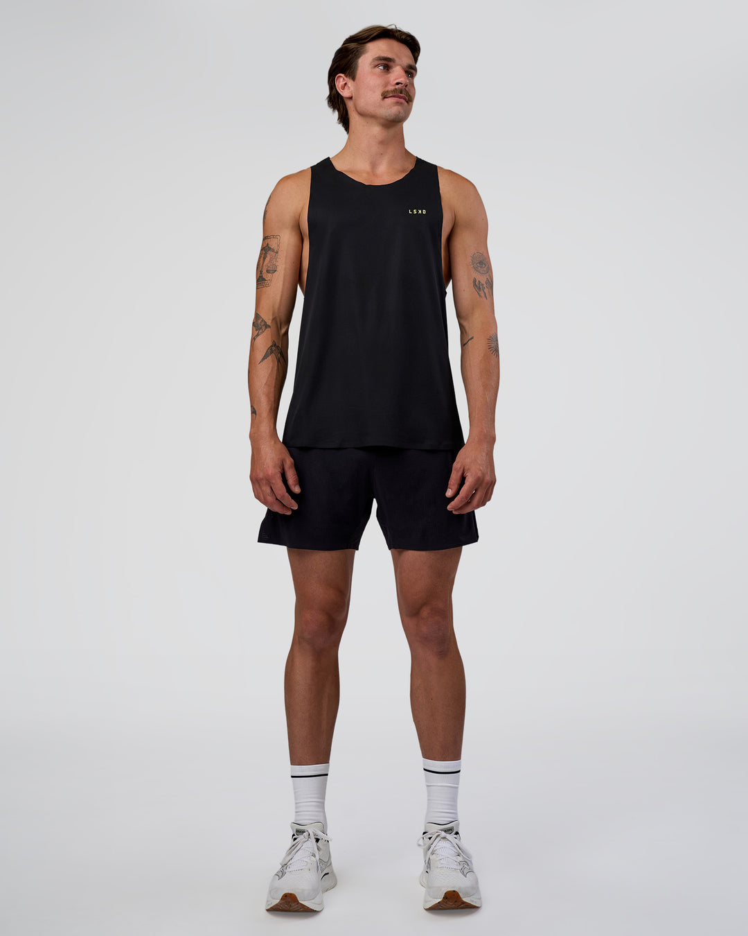 Man wearing Race Day Tank - Black-Yellow Fizz | Model:Konnor | Size:M