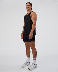 Man wearing Race Day Tank - Black-Yellow Fizz | Model:Konnor | Size:M