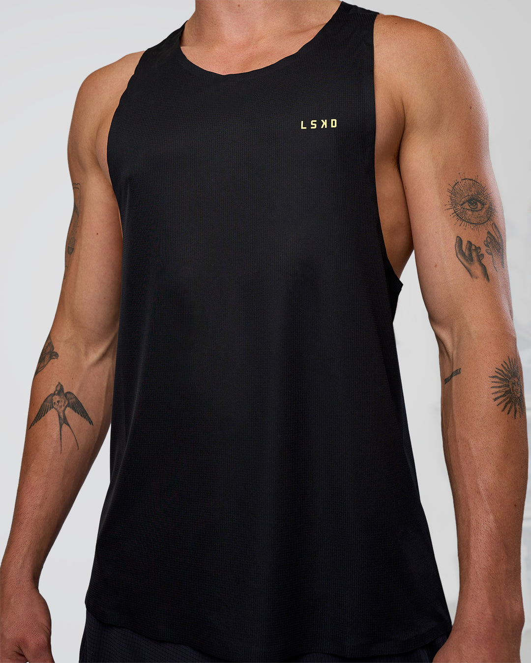 Man wearing Race Day Tank - Black-Yellow Fizz | Model:Konnor | Size:M