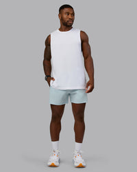 Man wearing Rep 5'' Performance Short in Skyride | Size:M
