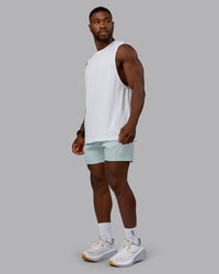 Man wearing Rep 5'' Performance Short in Skyride | Size:M