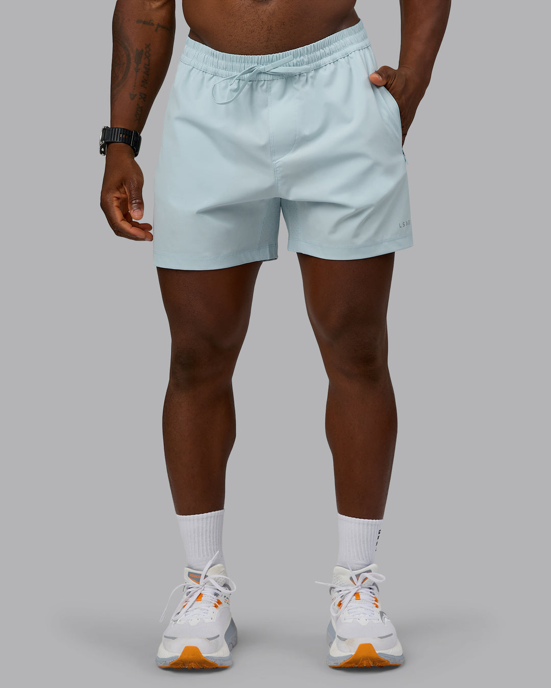 Man wearing Rep 5'' Performance Short in Skyride | Size:M