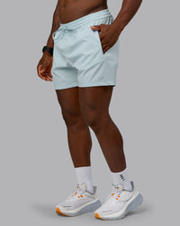 Man wearing Rep 5'' Performance Short in Skyride | Size:M