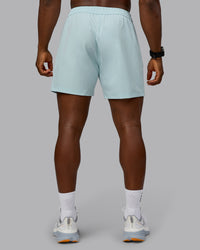 Man wearing Rep 5'' Performance Short in Skyride | Size:M