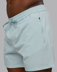 Man wearing Rep 5'' Performance Short in Skyride | Size:M