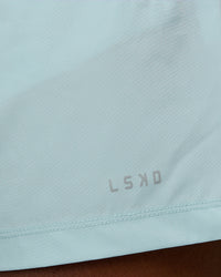 Man wearing Rep 5'' Performance Short in Skyride | Size:M