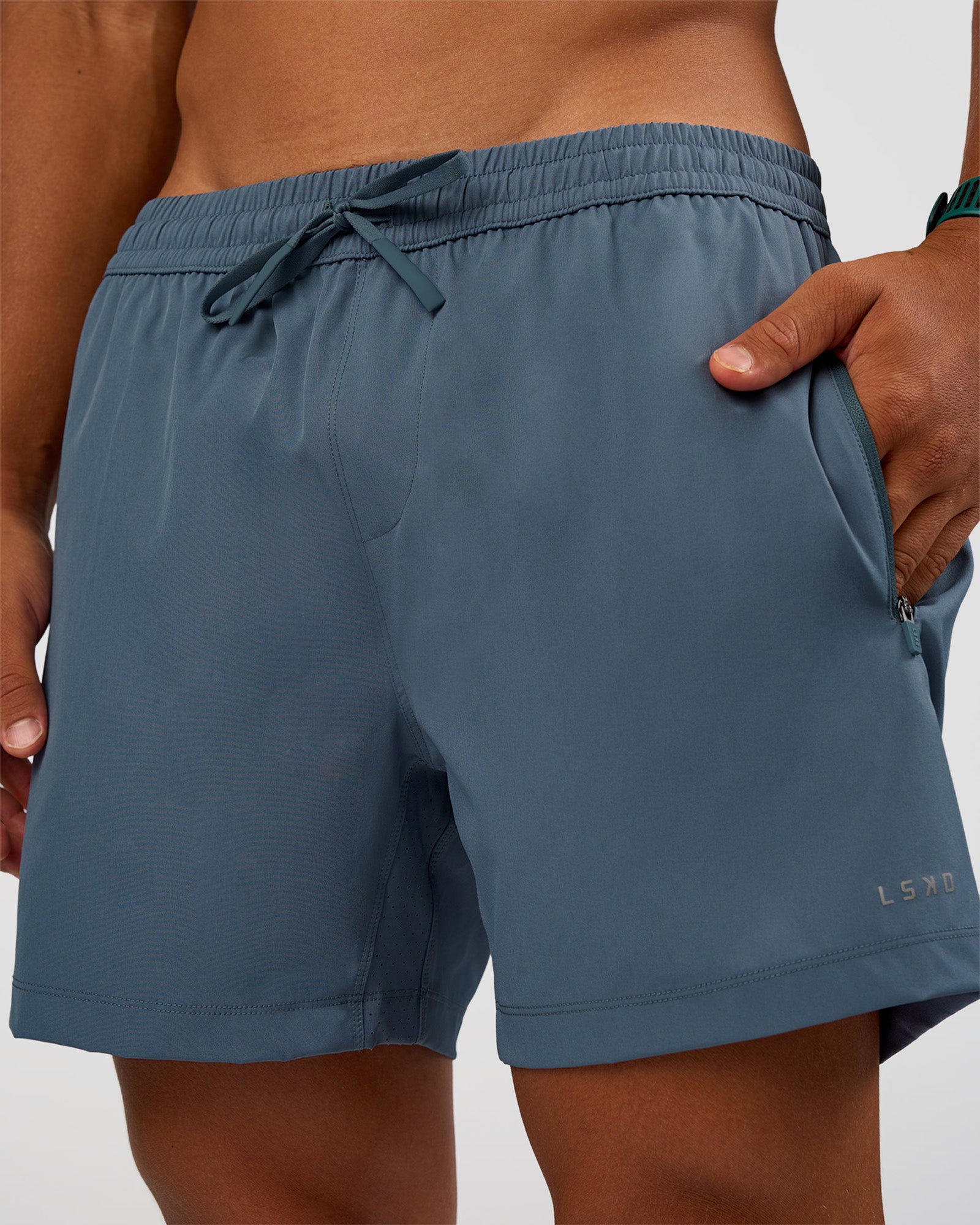 Man wearing Rep 5" Performance Short - Blue Mirage | Model:George | Size:M