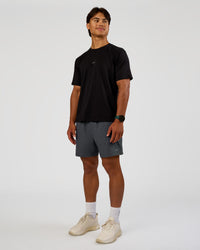 Man wearing Rep 5" Performance Short - Dark Storm | Model:George | Size:M