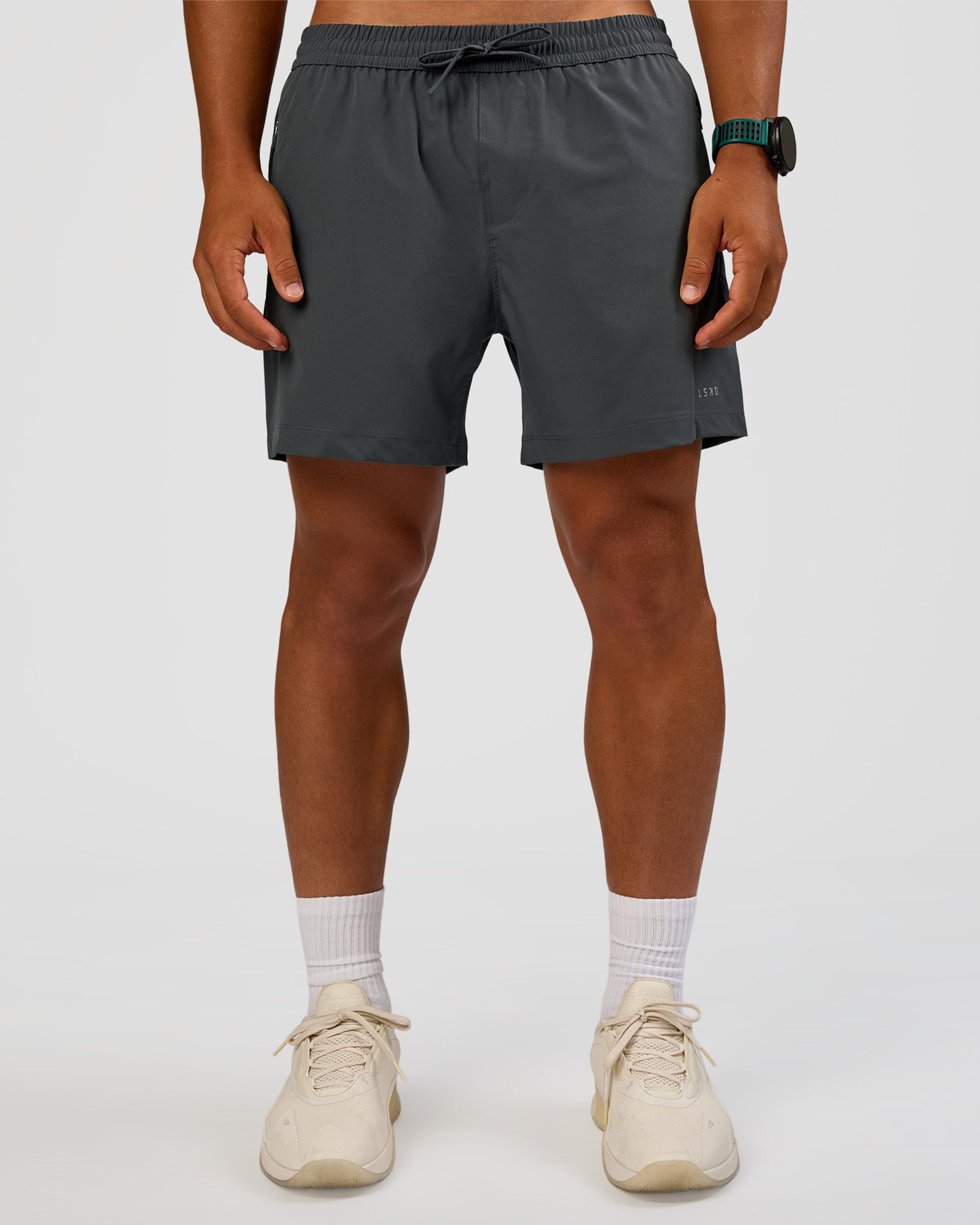 Man wearing Rep 5" Performance Short - Dark Storm | Model:George | Size:M
