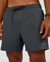 Man wearing Rep 5" Performance Short - Dark Storm | Model:George | Size:M