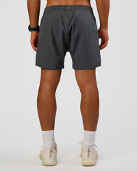 Man wearing Rep 5" Performance Short - Dark Storm | Model:George | Size:M