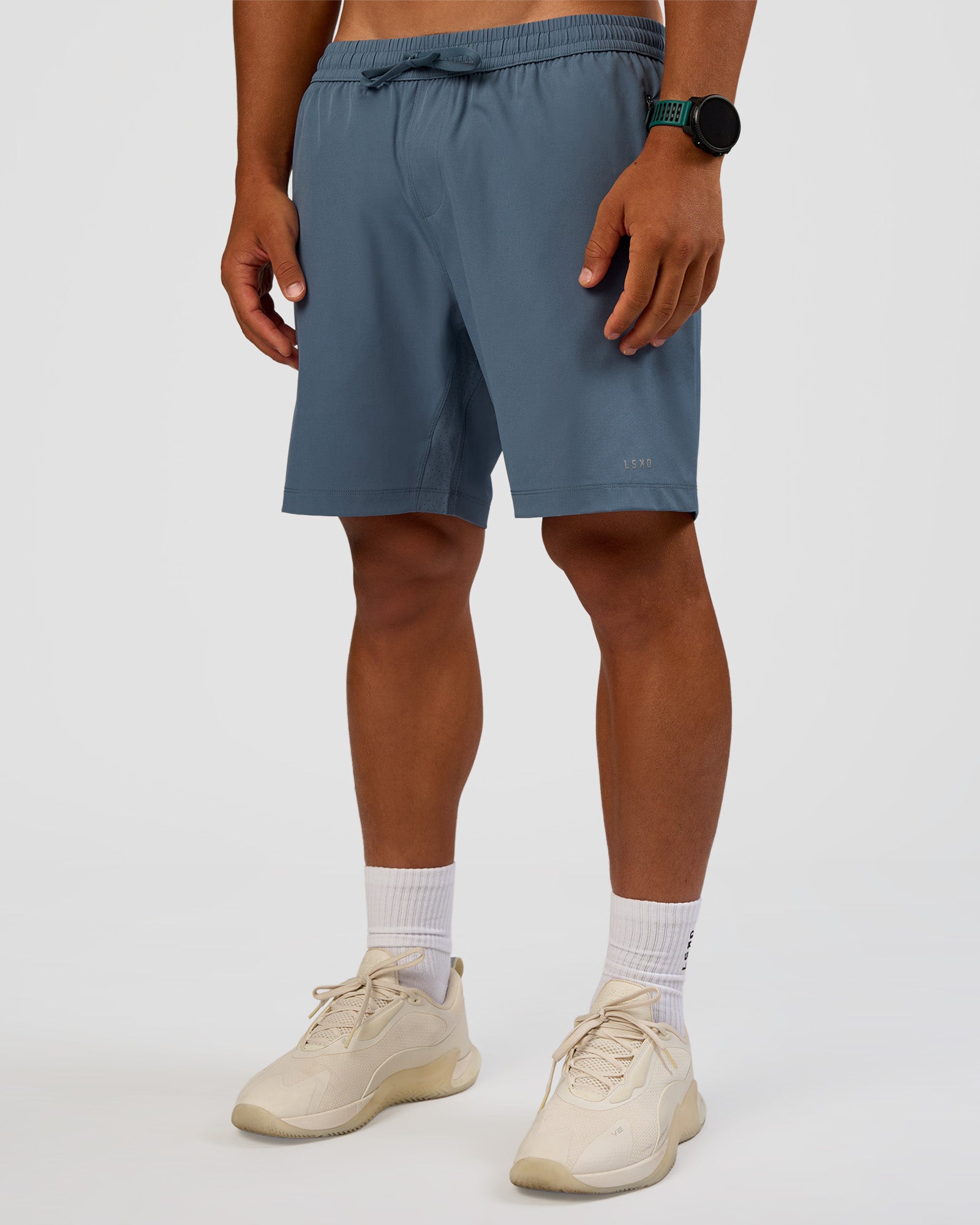 Man wearing Rep 7'' Performance Short - Blue Mirage | Model:George | Size:M