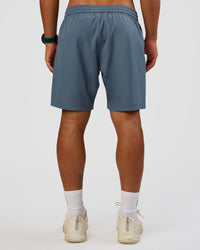 Man wearing Rep 7'' Performance Short - Blue Mirage | Model:George | Size:M