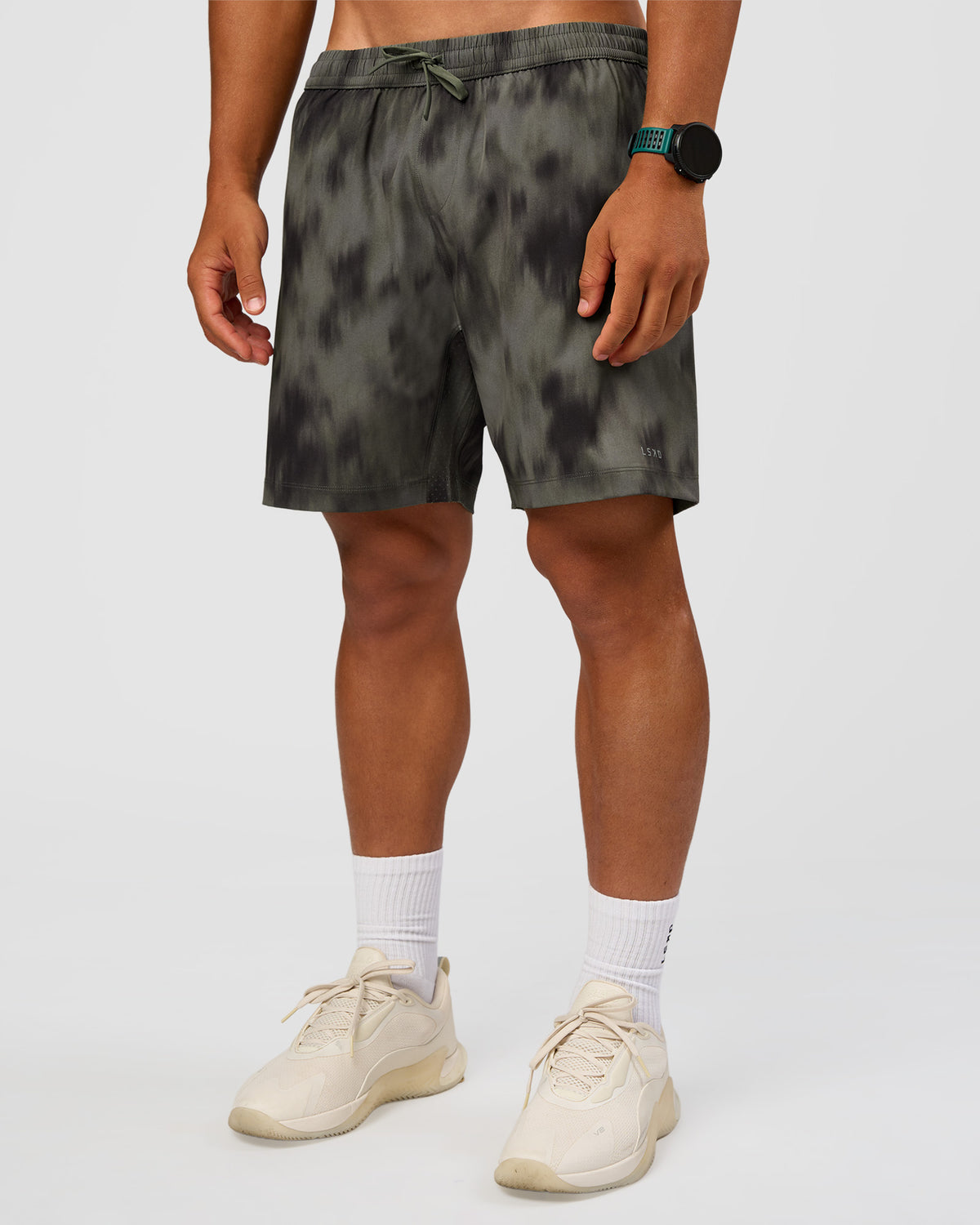 Man wearing Rep 7" Performance Short - Camo Washed Walnut Grey | Model:George | Size:M