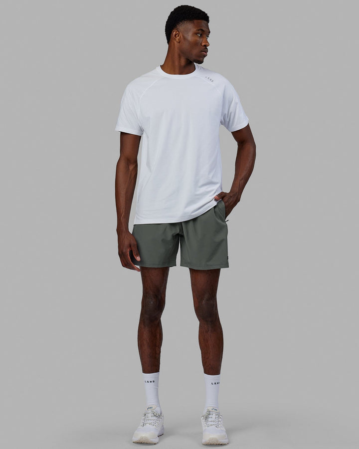 Man wearing Rep 7'' Performance Short - Graphite