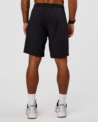 Man wearing Rep 9'' Training Short - Black | Model:Malebo | Size:M