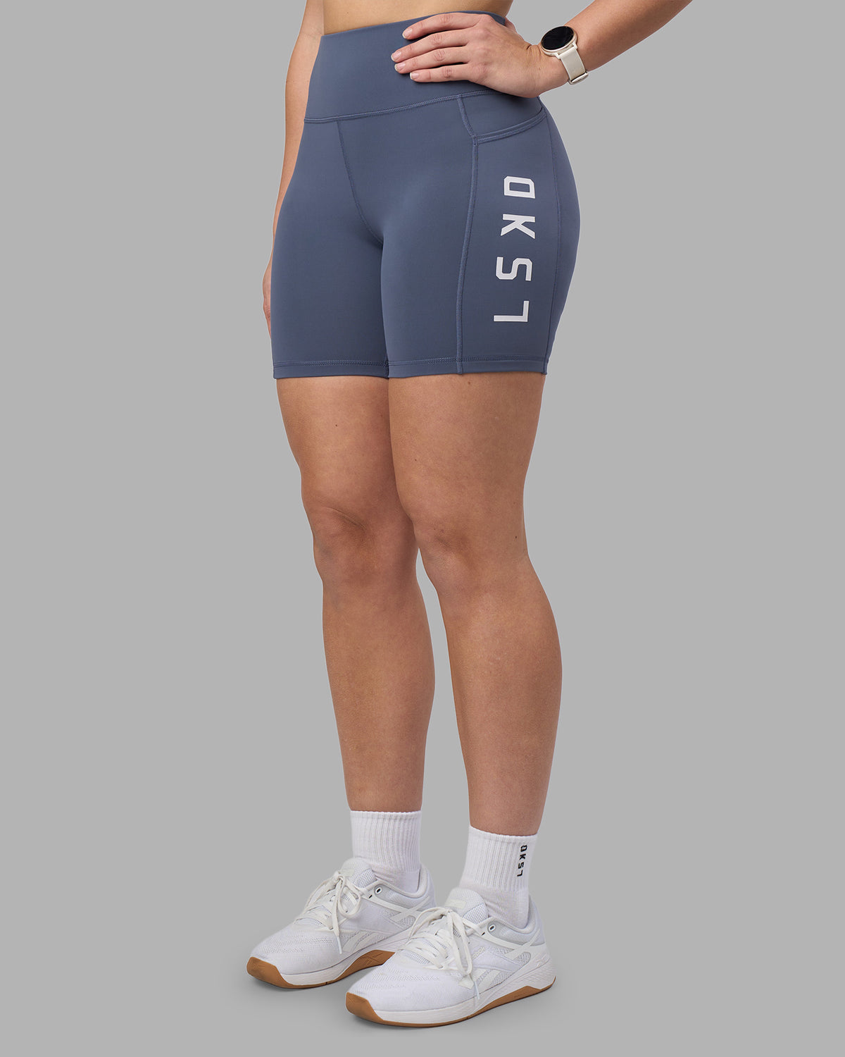 Woman wearing Rep Ultra High-Rise 6" Short Pockets - Night Shadow-White | Model:Amy | Size:M