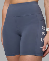 Woman wearing Rep Ultra High-Rise 6" Short Pockets - Night Shadow-White | Model:Amy | Size:M