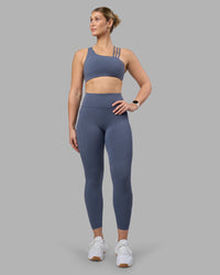 Woman wearing Rep Ultra High-Rise 7/8 Legging Pockets - Night Shadow-White | Model:Amy | Size:M
