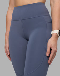 Woman wearing Rep Ultra High-Rise 7/8 Legging Pockets - Night Shadow-White | Model:Amy | Size:M