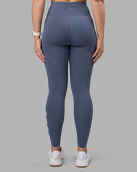 Woman wearing Rep Ultra High-Rise Full Length Legging Pockets - Night Shadow-White | Model:Amy | Size:M