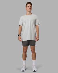 Man wearing Restore CloudFLX Short - Dark Storm | Model:Cameron | Size:M