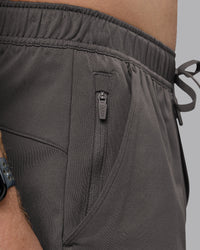 Man wearing Restore CloudFLX Short - Dark Storm | Model:Cameron | Size:M
