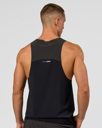 Man wearing Run Club Elevate Pace Running Tank - Black-Onyx | Model:Albert | Size:M