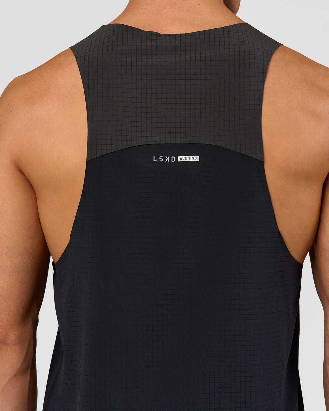 Man wearing Run Club Elevate Pace Running Tank - Black-Onyx | Model:Albert | Size:M