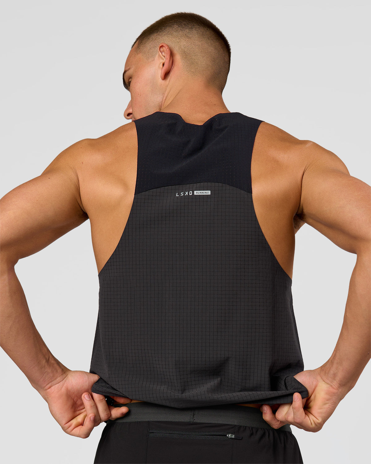 Man wearing Run Club Elevate Pace Running Tank - Onyx-Black | Model:Albert | Size:M