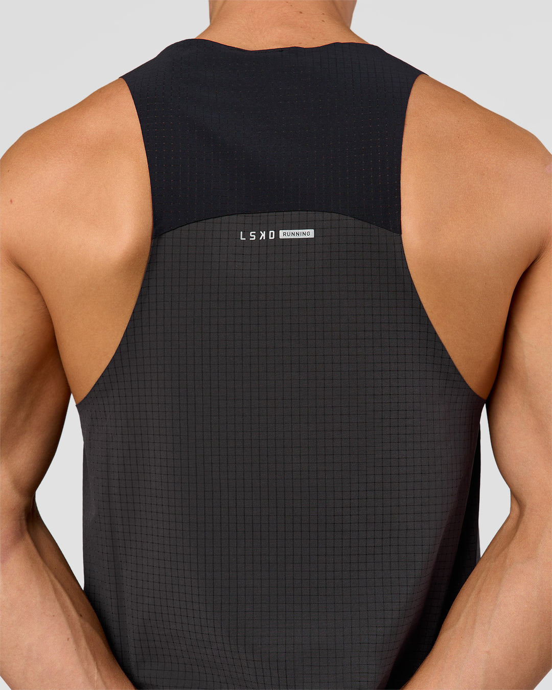Man wearing Run Club Elevate Pace Running Tank - Onyx-Black | Model:Albert | Size:M