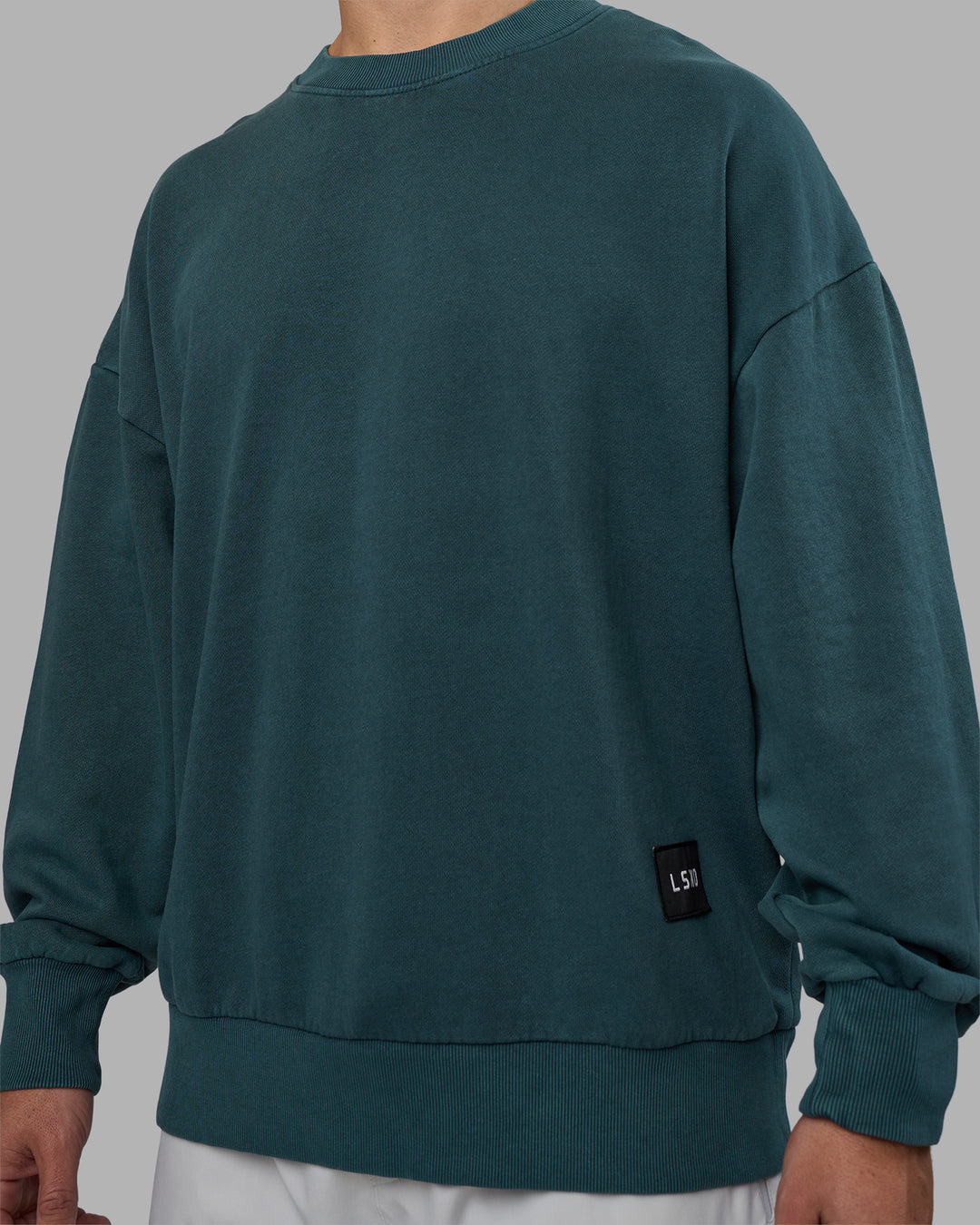 Man wearing Segmented Oversized Sweater - Abyssal | Model:Jaiden | Size:M
