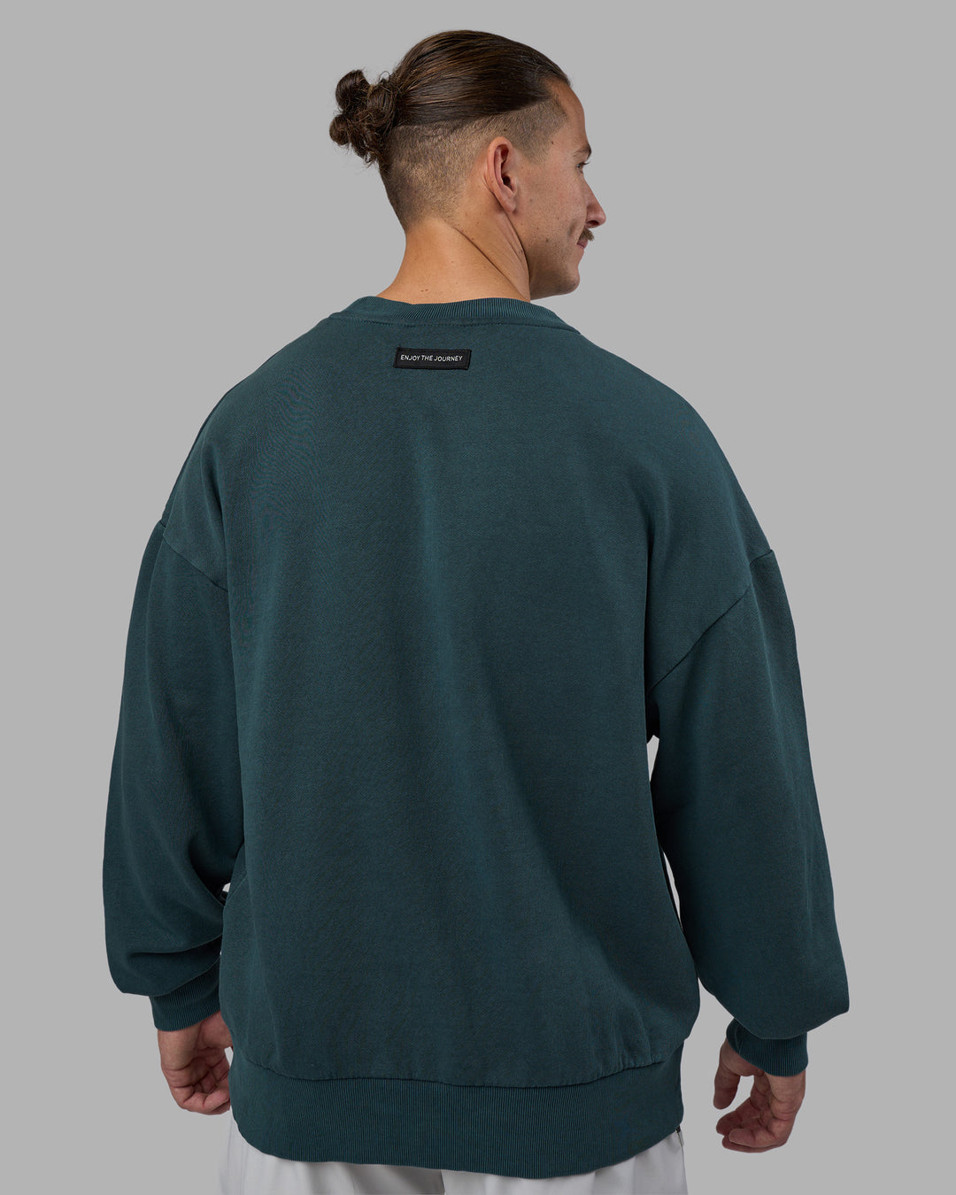 Man wearing Segmented Oversized Sweater - Abyssal | Model:Jaiden | Size:M
