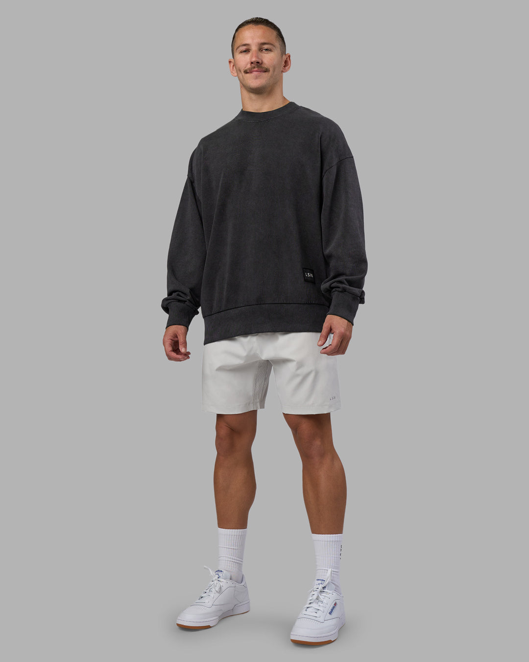 Man wearing Segmented Oversized Sweater - Black Washed | Model:Jaiden | Size:M
