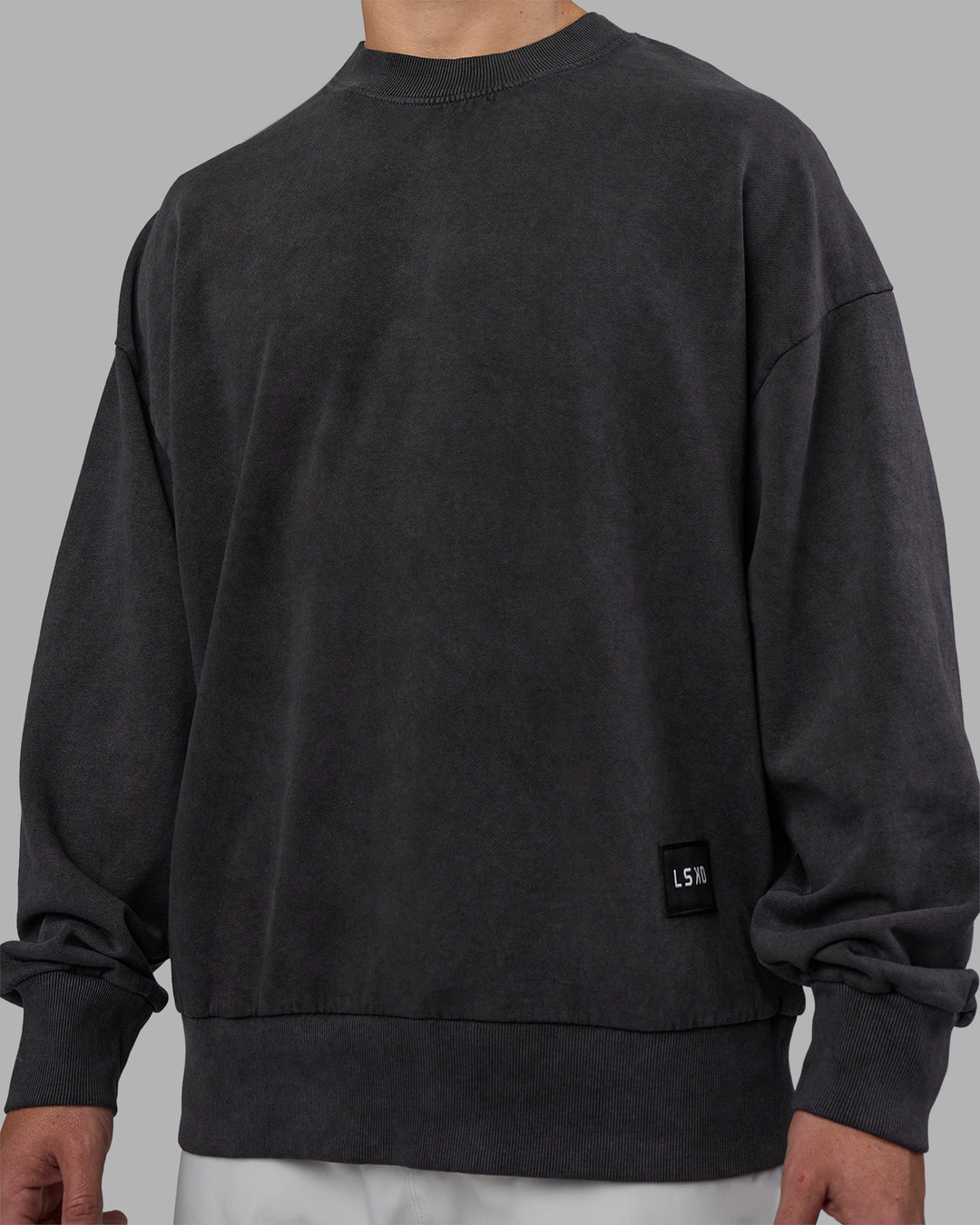 Man wearing Segmented Oversized Sweater - Black Washed | Model:Jaiden | Size:M