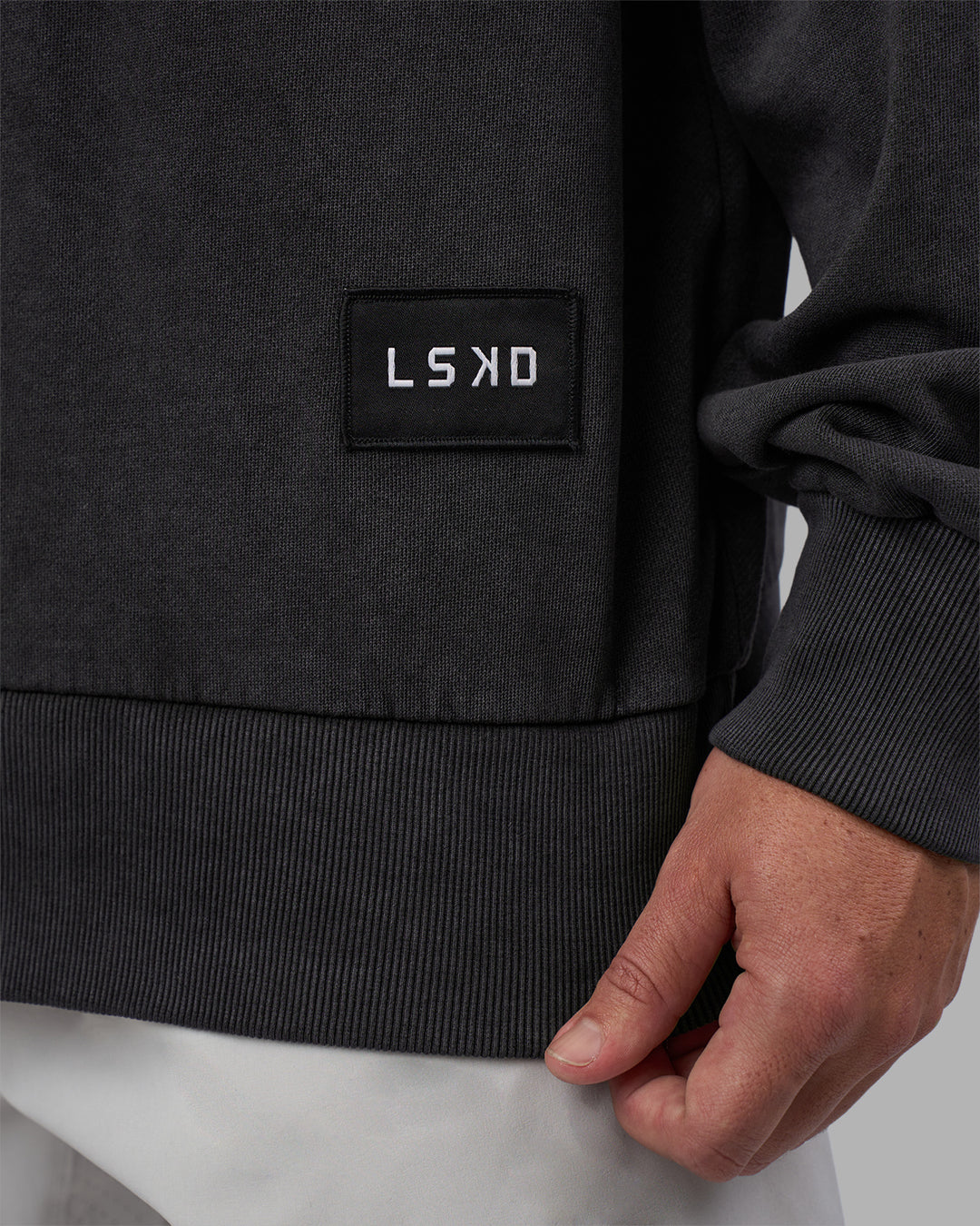 Man wearing Segmented Oversized Sweater - Black Washed | Model:Jaiden | Size:M