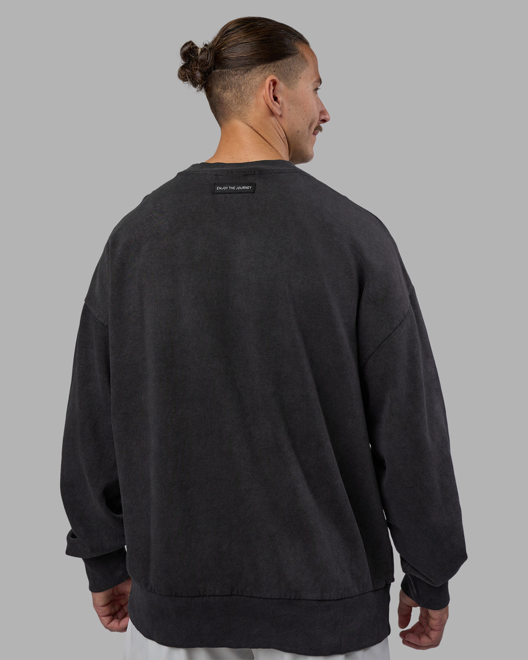 Man wearing Segmented Oversized Sweater - Black Washed | Model:Jaiden | Size:M