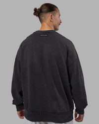 Man wearing Segmented Oversized Sweater - Black Washed | Model:Jaiden | Size:M