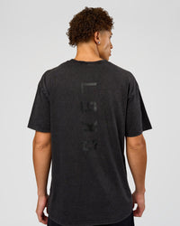 Man wearing Shadow Mode FLXCotton Oversized Tee - Black Washed | Model:Leandro | Size:M