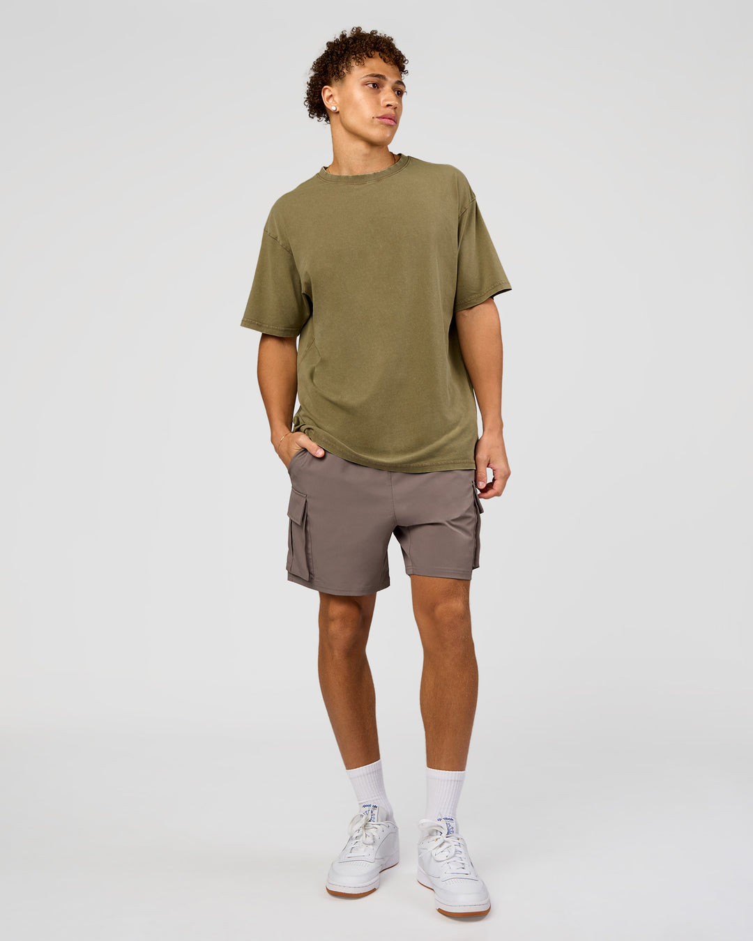 Man wearing Shadow Mode FLXCotton Oversized Tee - Walnut Grey Washed | Model:Leandro | Size:M