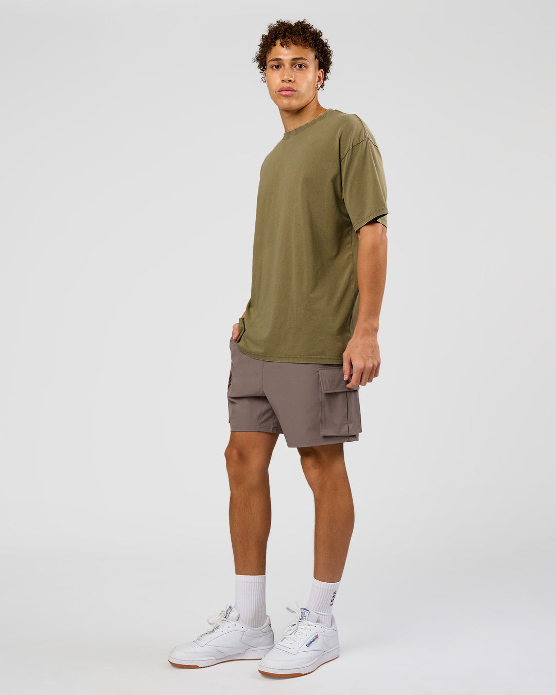 Man wearing Shadow Mode FLXCotton Oversized Tee - Walnut Grey Washed | Model:Leandro | Size:M