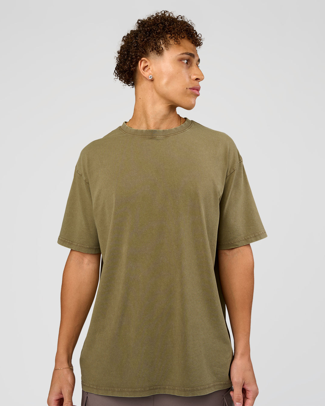 Man wearing Shadow Mode FLXCotton Oversized Tee - Walnut Grey Washed | Model:Leandro | Size:M