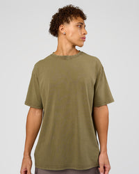 Man wearing Shadow Mode FLXCotton Oversized Tee - Walnut Grey Washed | Model:Leandro | Size:M