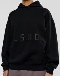 Man wearing Shadow Mode Oversized Hoodie - Black | Model:Leandro | Size:M