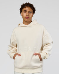 Man wearing Shadow Mode Oversized Hoodie - Off White | Model:Leandro | Size:M